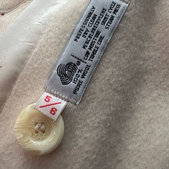 This is a white/cream wool vintage, long coat. Size 5/6. - Picture 3 of 11